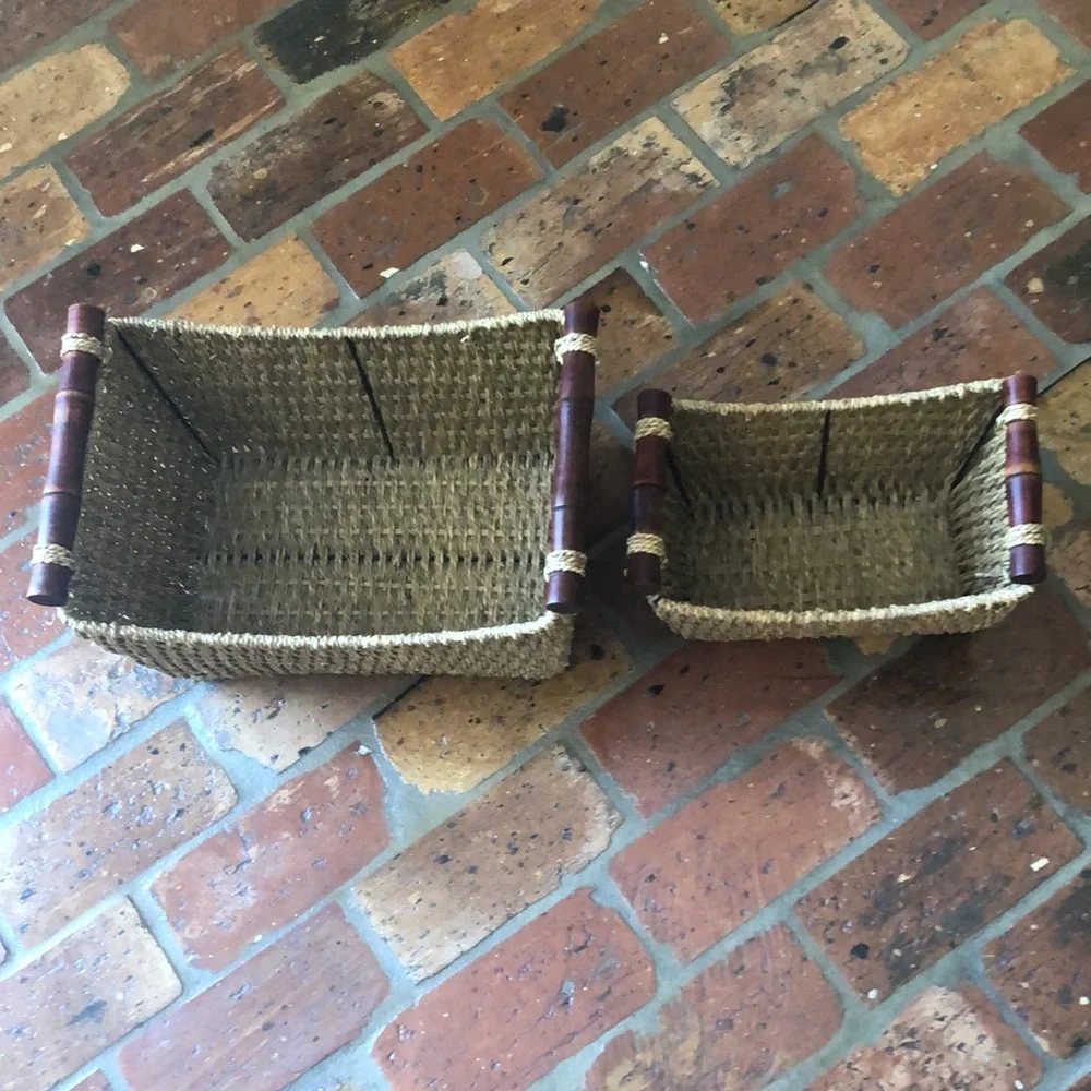 2 Wicker storage baskets with wooden handles
